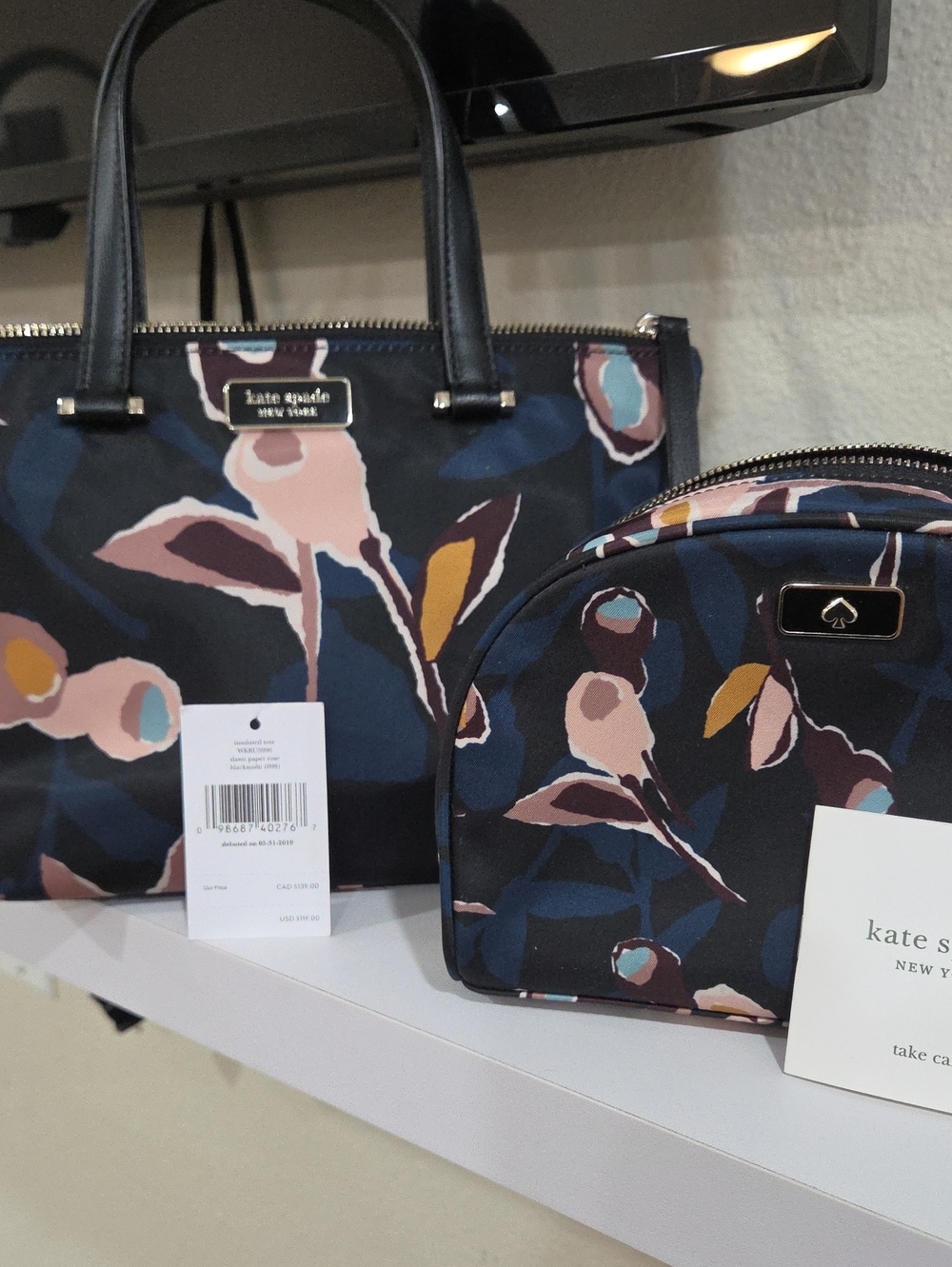 kate spade navy floral tote and matching cosmetic pouch